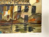 a watercolor painting of a house on the water