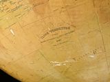 a very old globe with a map on it