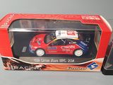 a toy car in the box on the table