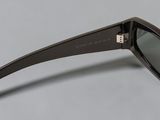 side view of a pair of sunglasses showing the frame and lens