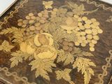 an image of a decorative box with flowers and leaves on it