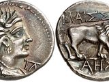 a silver coin with an image of a woman and a horse on it