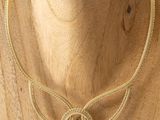 a close up of a necklace on a mannequin mannequin mannequin mannequin mannequin mannequin mannequin mannequin
