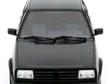 a black van that is parked on the side of the road