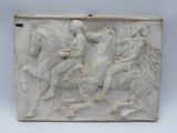 marble relief of a man riding a horse and a woman on a horse