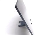a close up of a cell phone on a stand