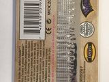 a package of scissors on a table with a barcode on it
