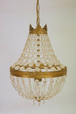 a gold chandelier hanging from a ceiling