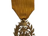 une image représentant une médaille d'or sur fond blanc