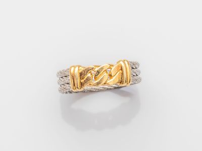a gold and silver ring with a braid design