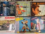 a lot of music books on the table