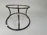 a close up of a metal table with a glass top