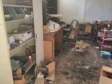 a room with a lot of boxes and boxes on the floor