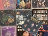 a lot of records on the wall of a room