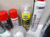 many different types of spray paint on the counter