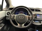 the interior of a car with a steering wheel and dashboard controls