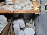 a room with a lot of boxes and boxes on the shelves