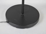 an image of a black table lamp on a white surface