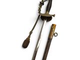 an old sword with a wooden handle on a white background