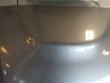 a close up of a car ' s hood with the hood down