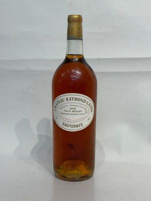 a bottle of whiskey that is sitting on a table