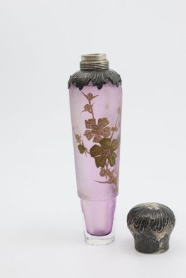 two vases sitting next to each other on a white surface