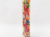a close up of a wooden block with a bunch of candy on it