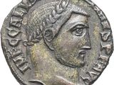 une pièce d'argent sur laquelle figurent le visage d'une femme et une couronne
