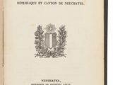 un vieux livre sur lequel figure un blason