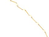 the bracelet is made of gold plated metal and has a white beaded chain