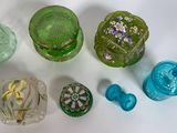 a lot of glass items that are on the table