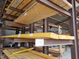 a large amount of wooden planks stacked on top of each other