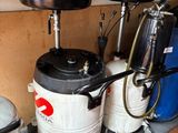 three different types of water tanks in this garage