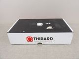 a white box with a black and red logo on it