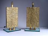 pair of brass and glass table lamps with brass bases