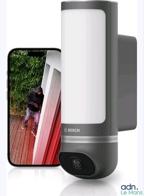 a picture of a camera that is next to a cell phone