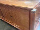 an image of a wooden chest in a room