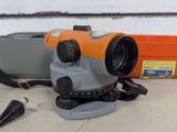 a close up of an orange and gray object on a table