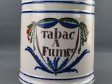 a ceramic container with a design on it that says tabac a fume