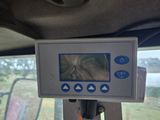 dashboard view of a vehicle with a digital display on the dashboard