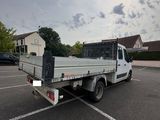a white truck that is parked in a parking lot