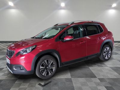 a red 2019 toyota rav parked in a garage