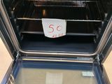 a sign on the door of an oven that says 50 cents