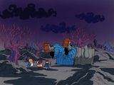 scène de dessin animé représentant un groupe de personnes dans une région désertique parsemée de rochers et d'arbres
