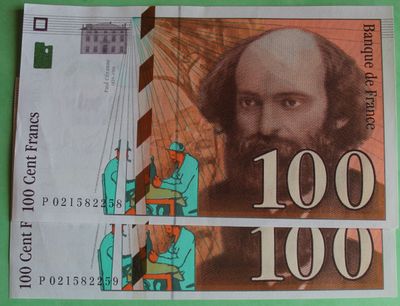 a close up of a piece of paper with a picture of a man on it