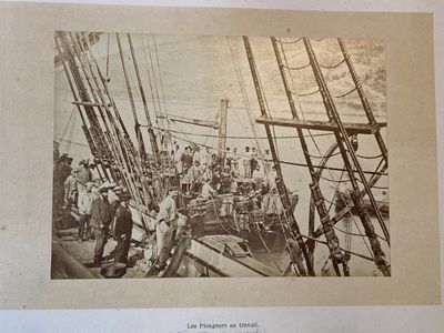 an old photo of a group of people on a boat