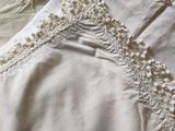 a close up of a piece of cloth with lace on it