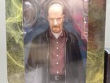 the action figure is in the box on the table