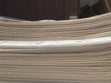 a stack of papers sitting on top of a table