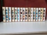 a lot of cassettes sitting on a white table